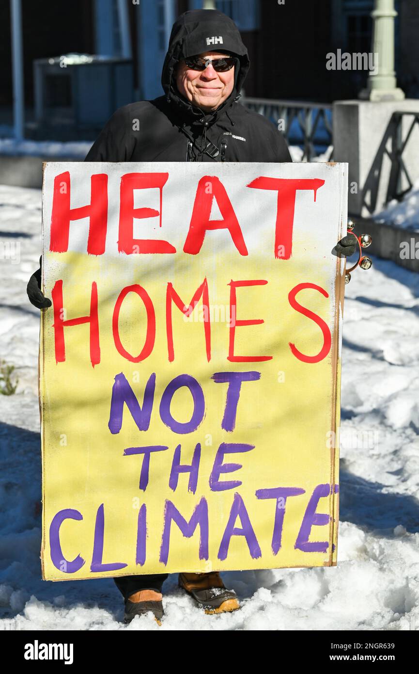 Heat Homes Not the Climate: Demonstranten auf einem märz, die Maßnahmen zur Bekämpfung des Klimawandels fordern, Montpelier, VT, USA. Stockfoto