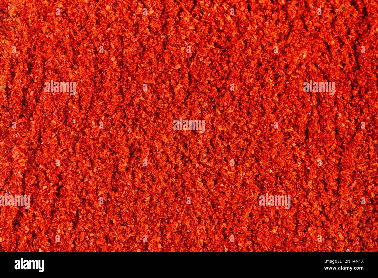 Chili-Paprika-Pulver, Hintergrundebene, Draufsicht Stockfoto