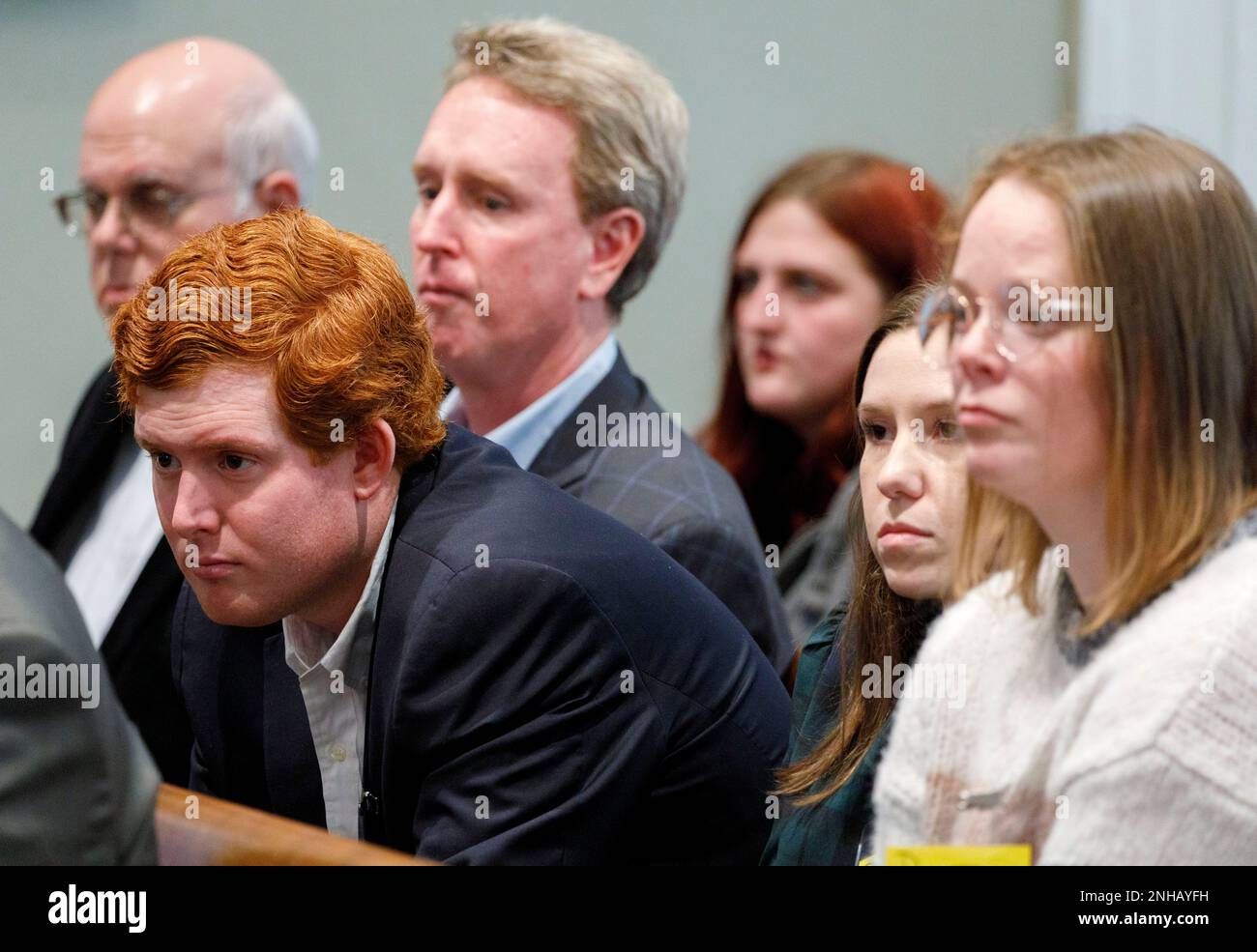 Members of the Murdaugh family, including Buster Murdaugh, center, Alex Murdaugh's son listens