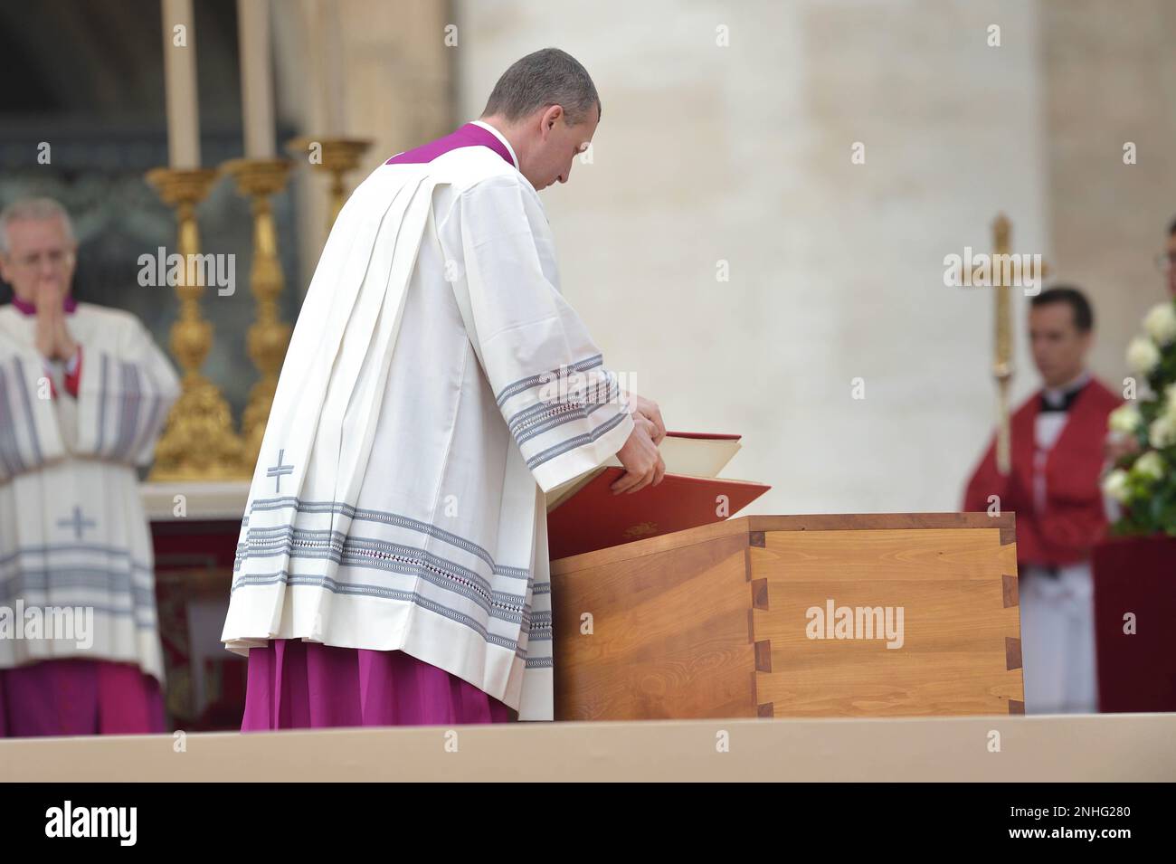 A priest at the funeral of Pope Emeritus Benedict XVI at St. Peter's ...