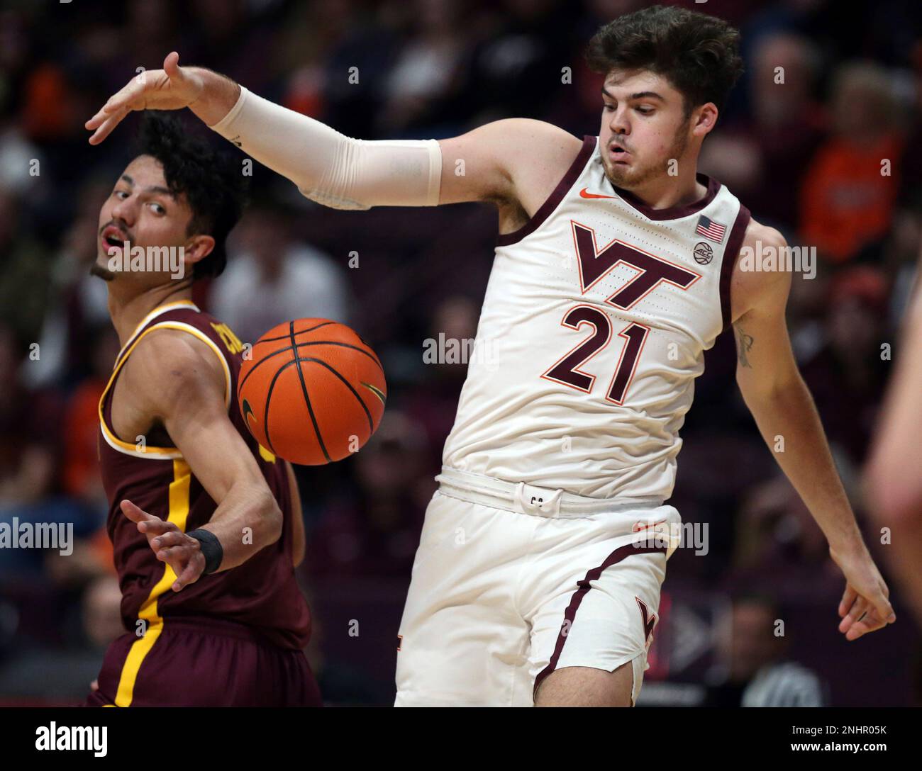 Minnesota's Dawson Garcia (3) left, and Virginia Tech's Grant Basile