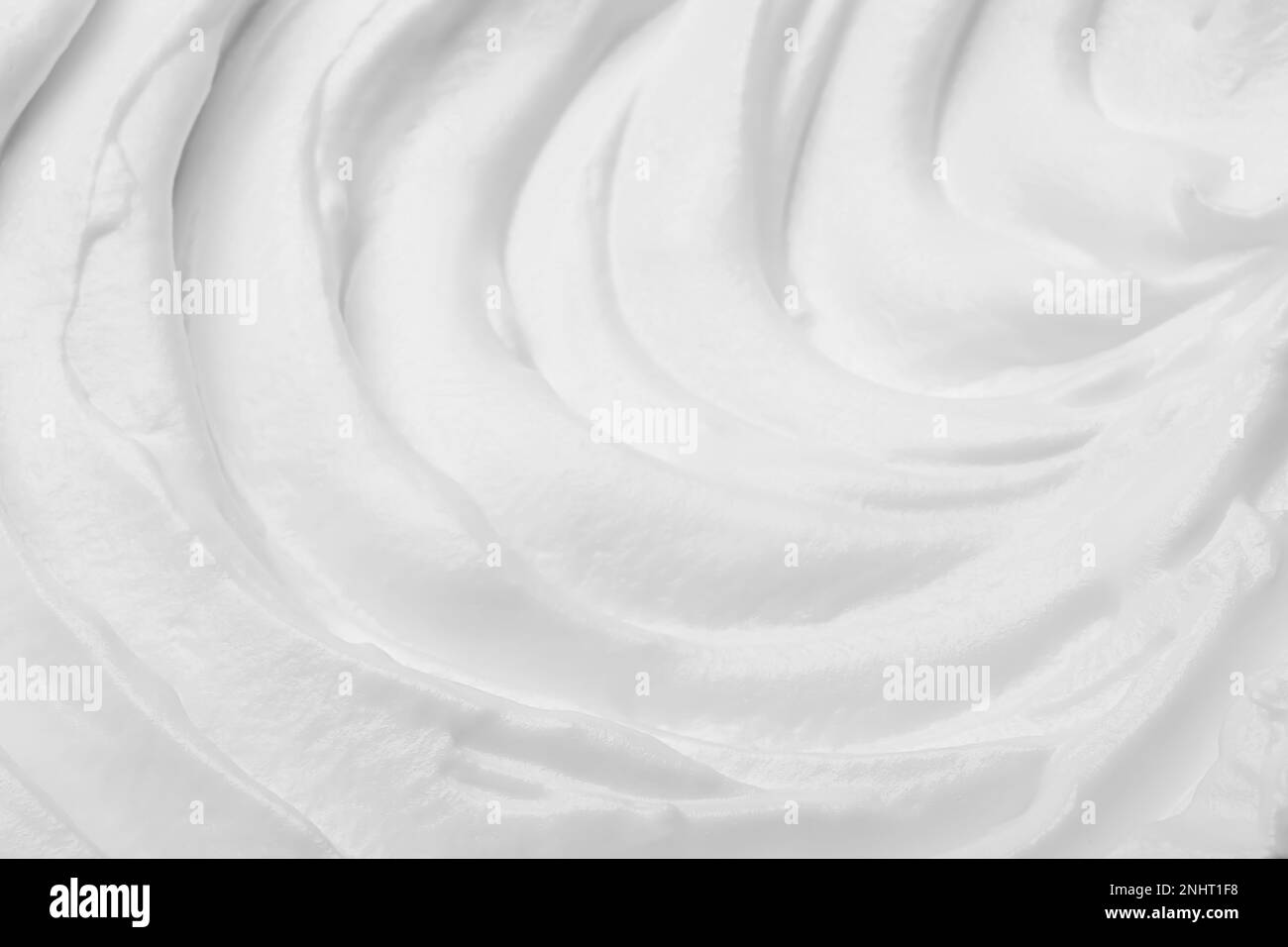 Weiße Schlagsahne als Hintergrund, Nahaufnahme Stockfoto