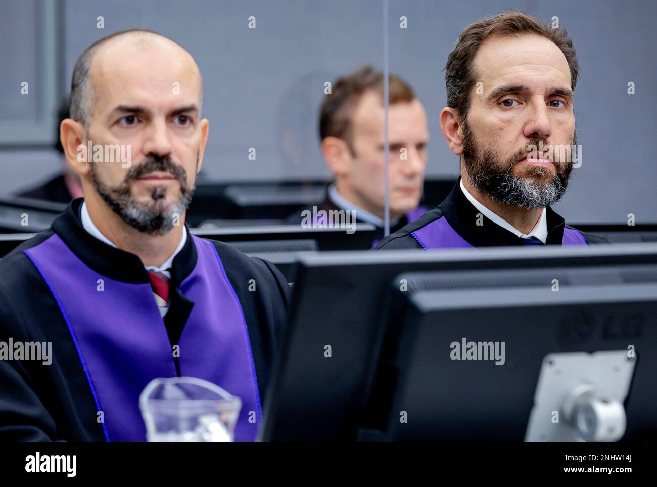 FILE Prosecutor Jack Smith, right, and Cezary Michalczuk, left, wait for the start of the