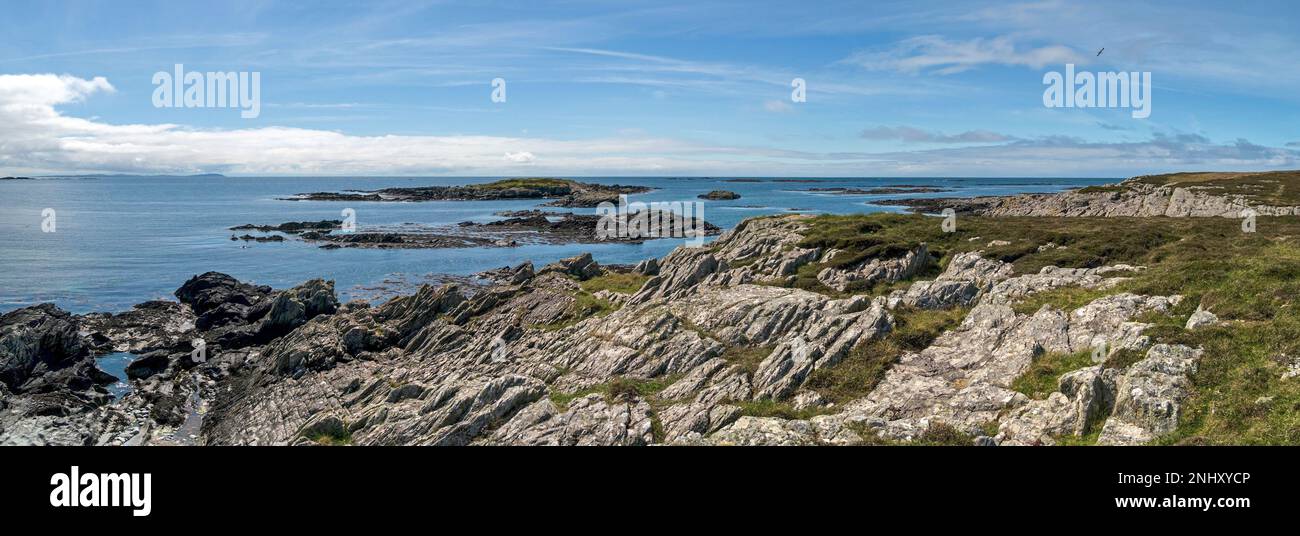 Panoramablick auf Atlantik und die Küste in der Nähe von Ardskenish, Insel Colonsay, schottischen Hebriden, Schottland, Vereinigtes Königreich. Stockfoto