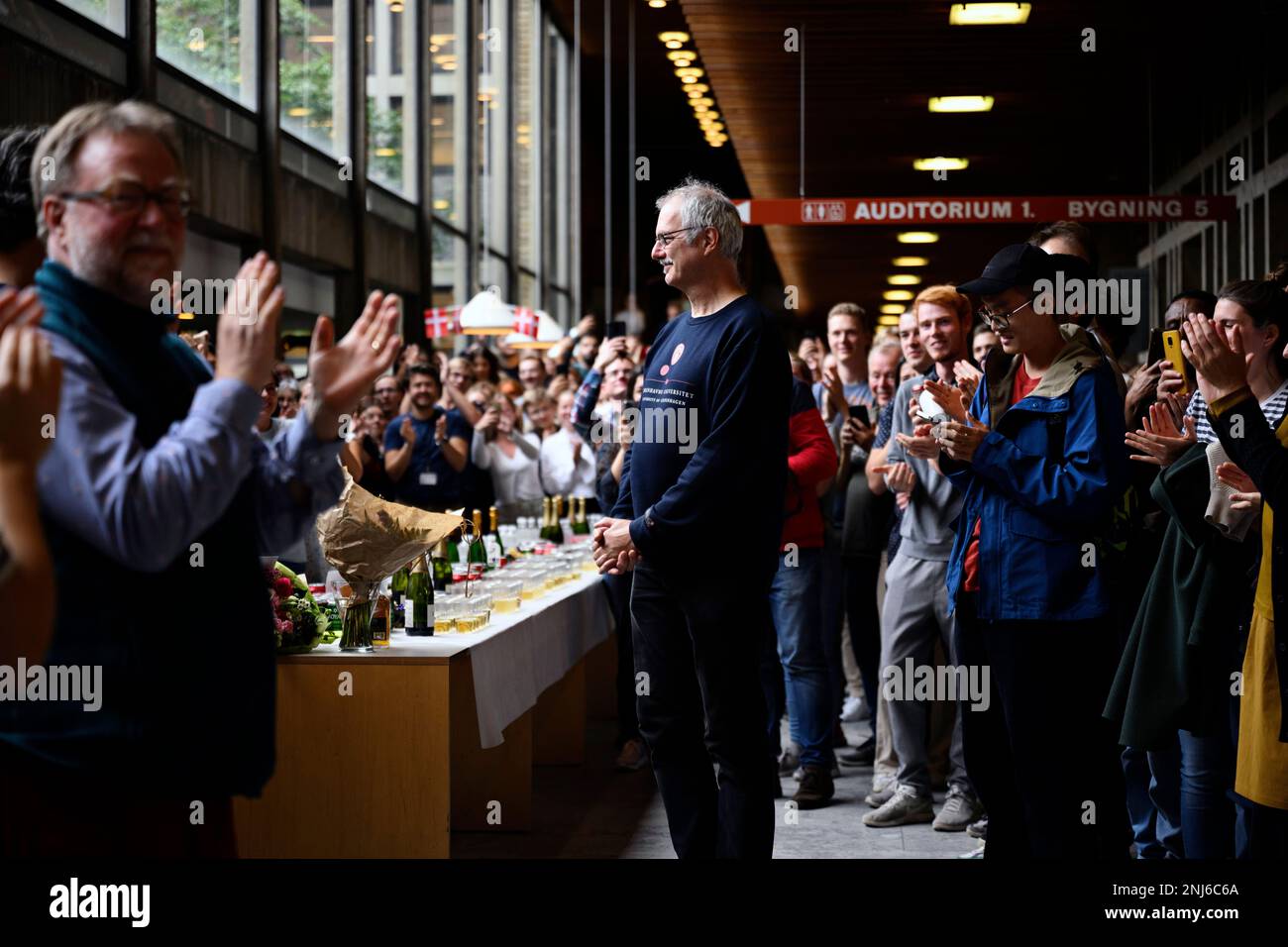 Nobel Prize in Chemistry winner Morten Meldal, center, is celebrated at