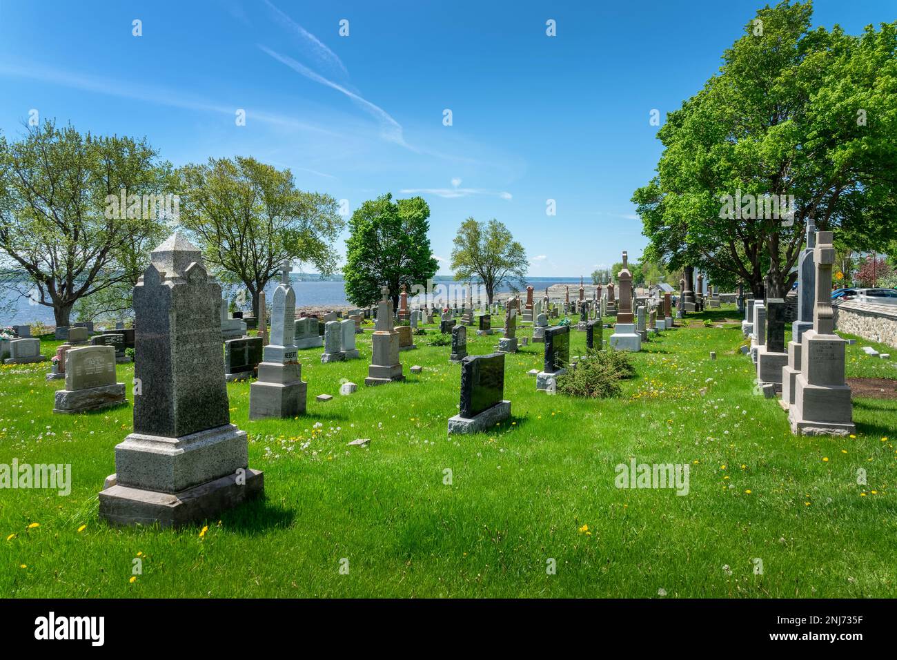 Alter Friedhof im Dorf Saint Jean auf der Insel Orleans in der Nähe von Quebec City, Kanada Stockfoto
