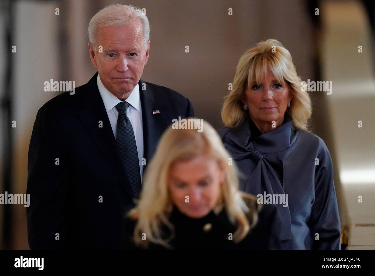 US President Joe Biden and First Lady Jill Biden view the coffin of