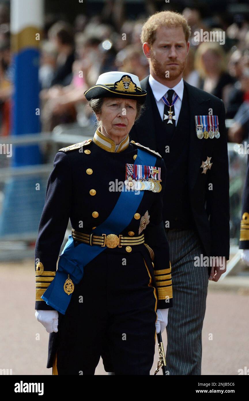 Princess Anne, followed by Prince Harry walk behind the coffin of Queen Elizabeth II during the procession for her Lying-in State, in London, Wednesday, Sept. 14, 2022. (Chris J Ratcliffe/Pool Photo via AP) Stockfoto