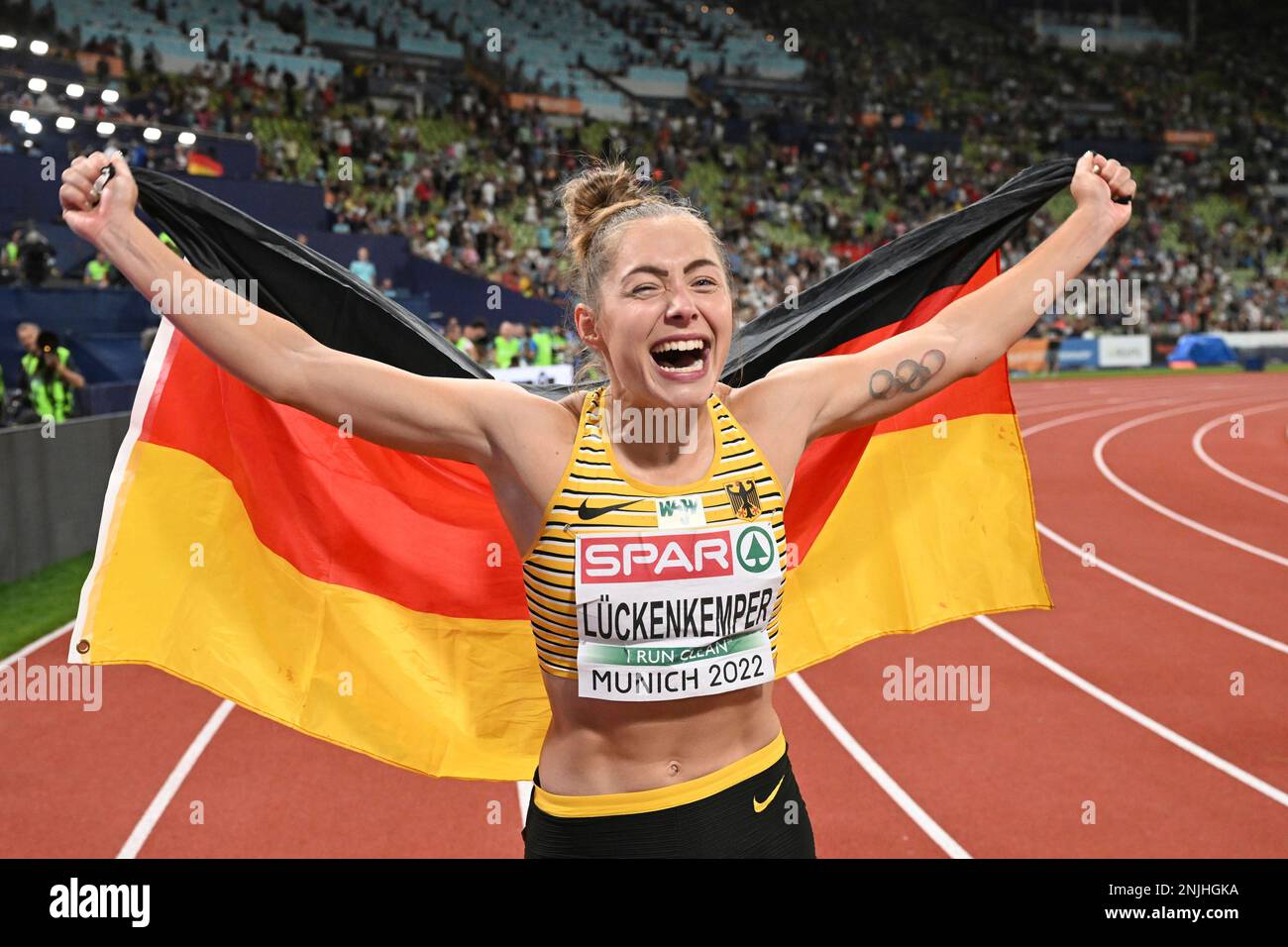 First-place winner Gina Luckenkemper of Germany cheers after the Women