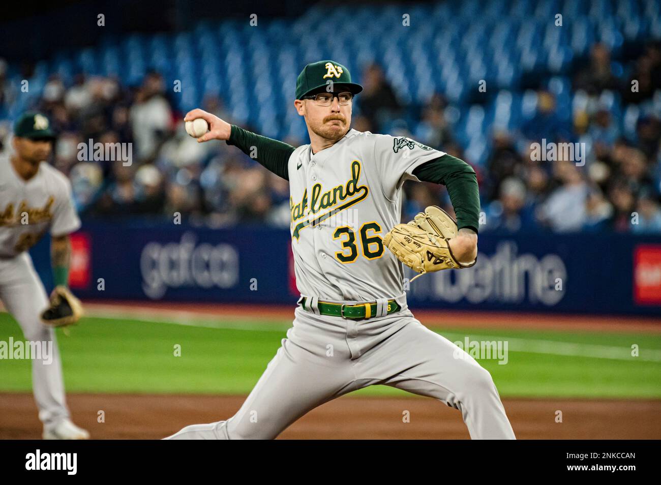 Oakland Athletics starting pitcher Adam Oller (36) throws the ball during the first inning of a MLB baseball game against the Toronto Blue Jays in Toronto on Sunday, April 17, 2022. (Christopher Katsarov/The Canadian Press via AP) Stockfoto