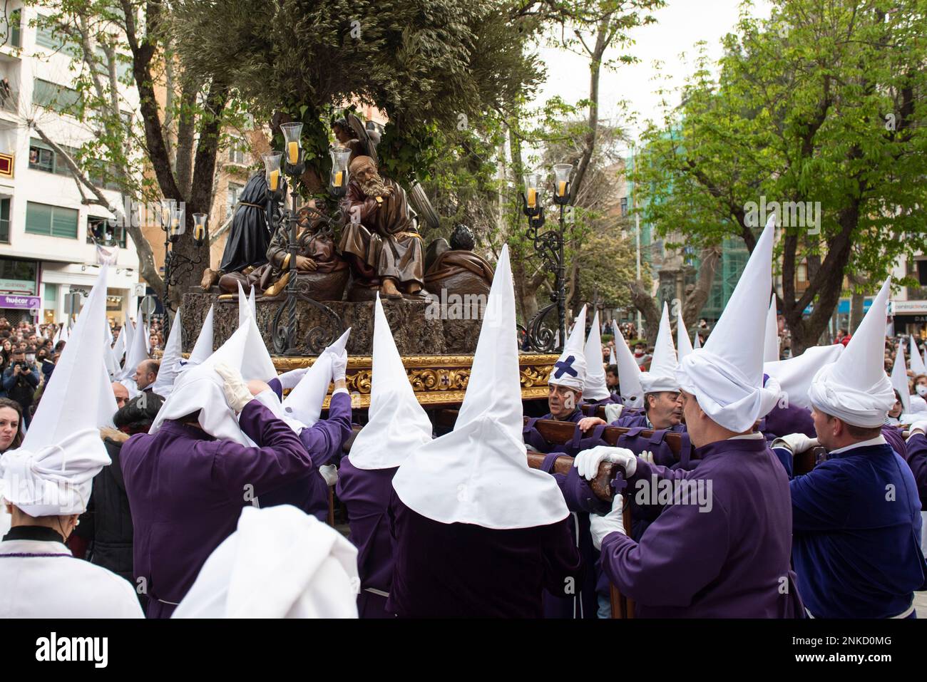 Nazarenes carry the paso of the Brotherhood of Jesus Praying in the ...