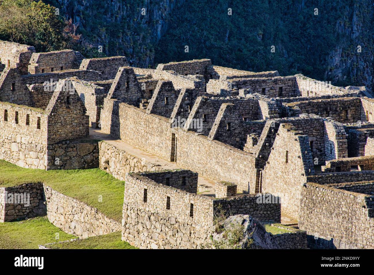 Feine Steinarbeiten an den antiken Inka-Ruinen von Machu Picchu, Peru. Stockfoto