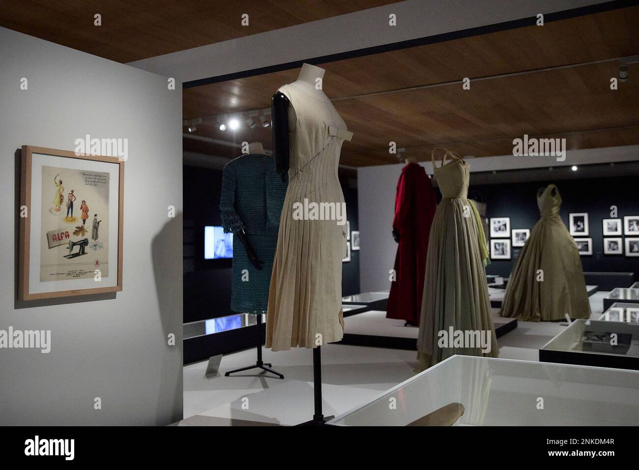 Costumes and white photographs and advertising of ALFA sewing machines