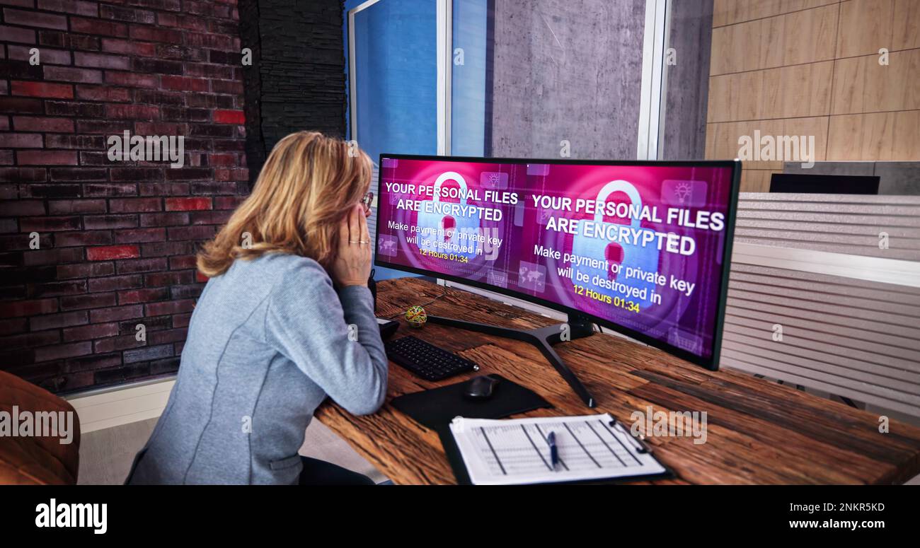 Ransomware-Malware-Angriff. Business-Computer Gehackt. Datenschutzverletzung Stockfoto
