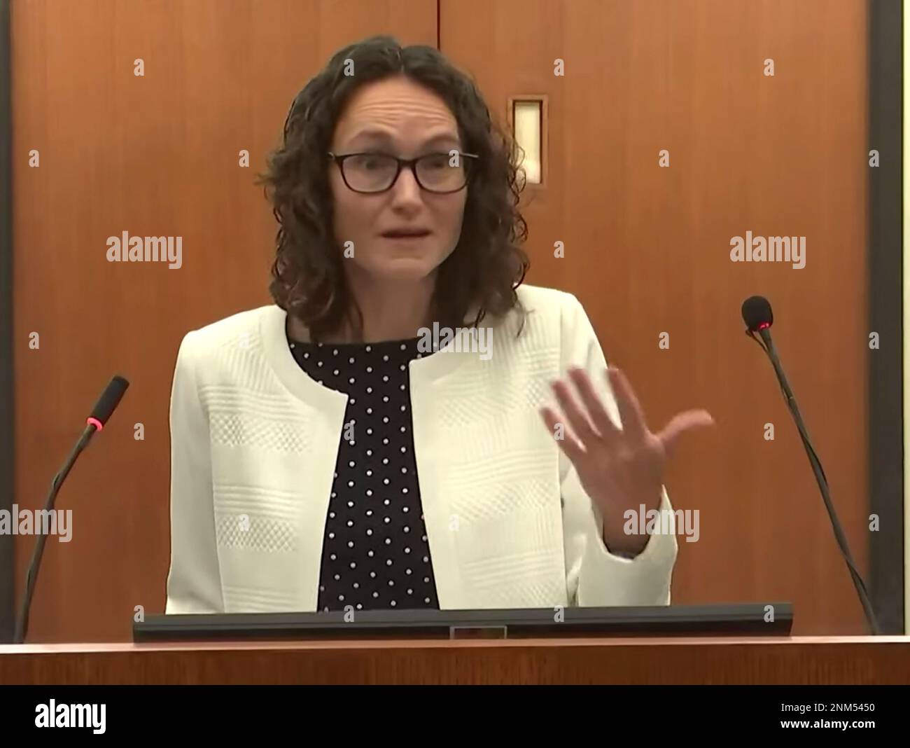 In this screen grab from video, Assistant Attorney General Erin