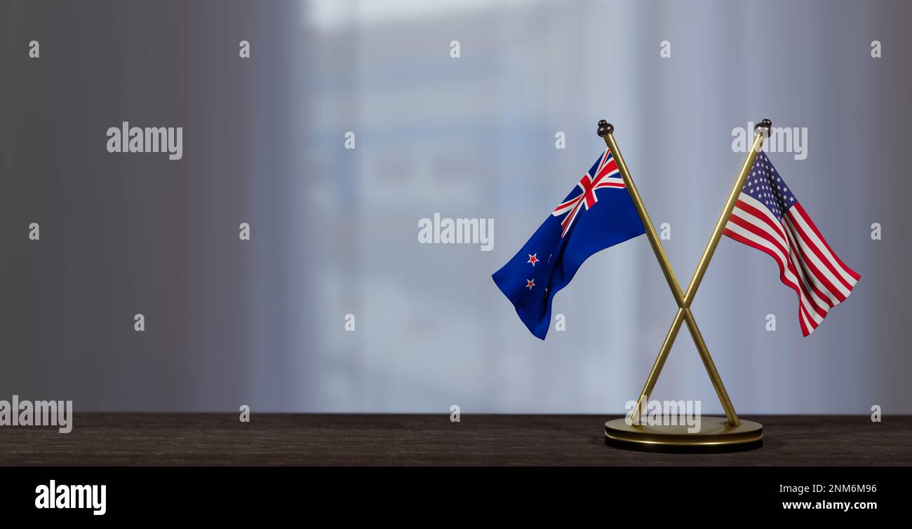 Flaggen Neuseeland und USA auf dem Tisch. Verhandlungen zwischen Neuseeland und den Vereinigten Staaten. Auf wenig unscharfem Hintergrund. 3D Arbeit und 3D Bild Stockfoto