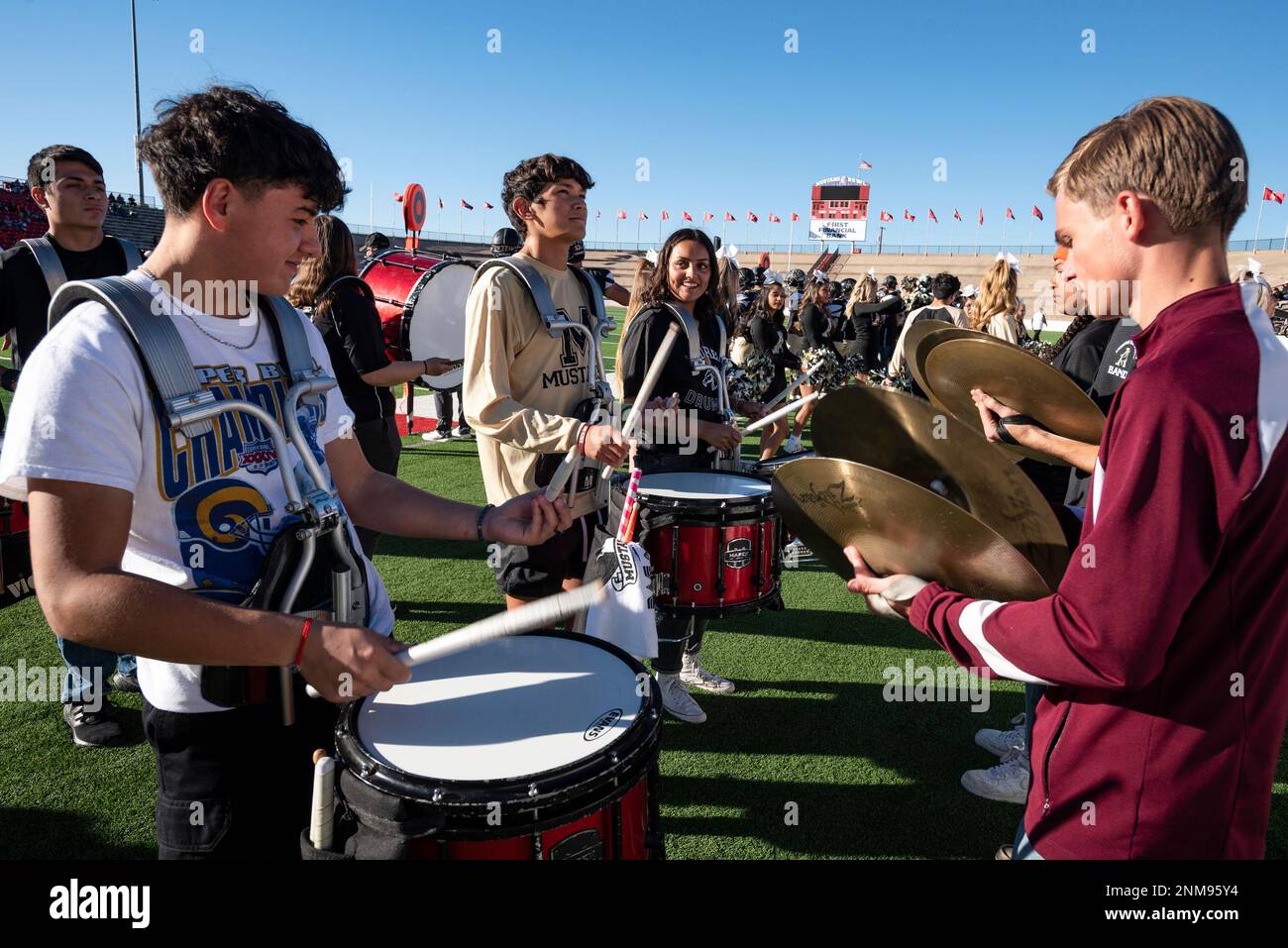 Members Of The Andrews High School Drum Line Play On The Sideline members-of-the-andrews-high-school-drum-line-play-on-the-sideline