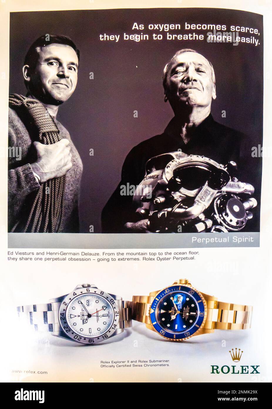 Rolex Perpetual Spirit Werbespot in einer Zeitschrift, Juli 2003. Rolex Explorer 2 und Rolex Submariner - Ed Viesturs und Henry-Germain Delauze Stockfoto