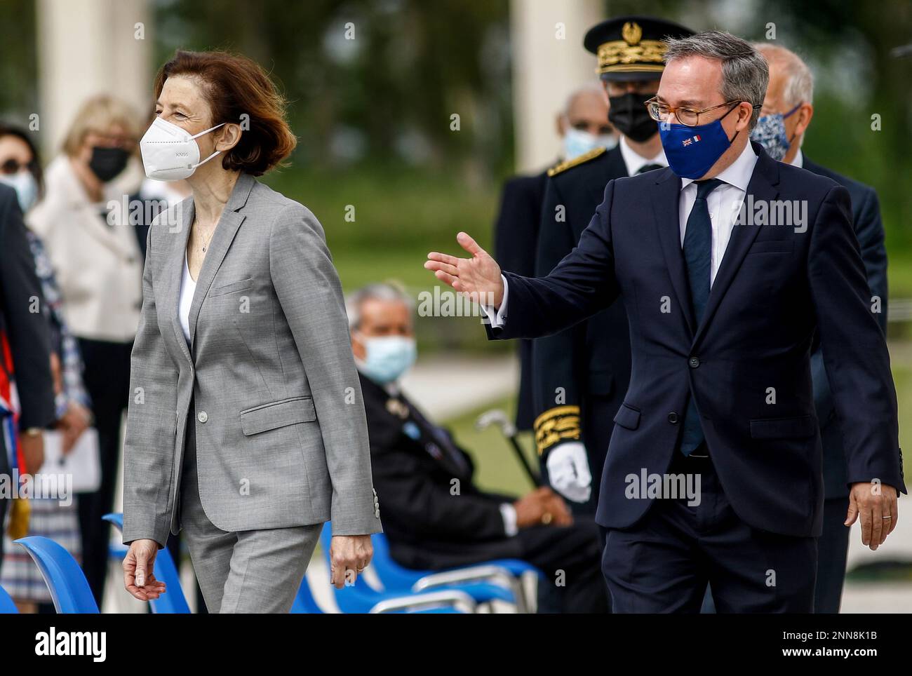 British ambassador to France, Edward Llewellyn, right, arrives with