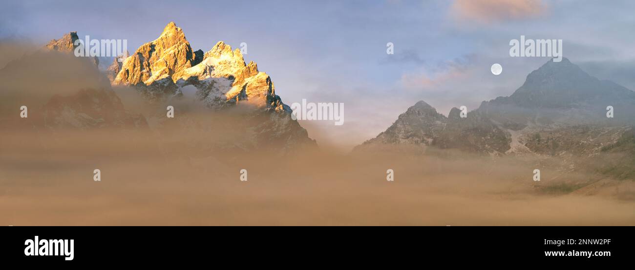 Cathedral Group, Bergkette hinter Nebel bei Sonnenaufgang, Grand Teton National Park, Wyoming, USA Stockfoto