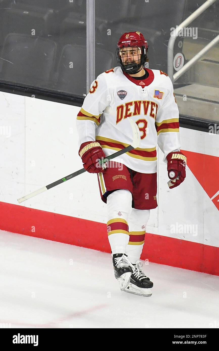 December 5, 2020 Denver Pioneers forward Carter Savoie (8) after scoring a goal during a NCAA D1