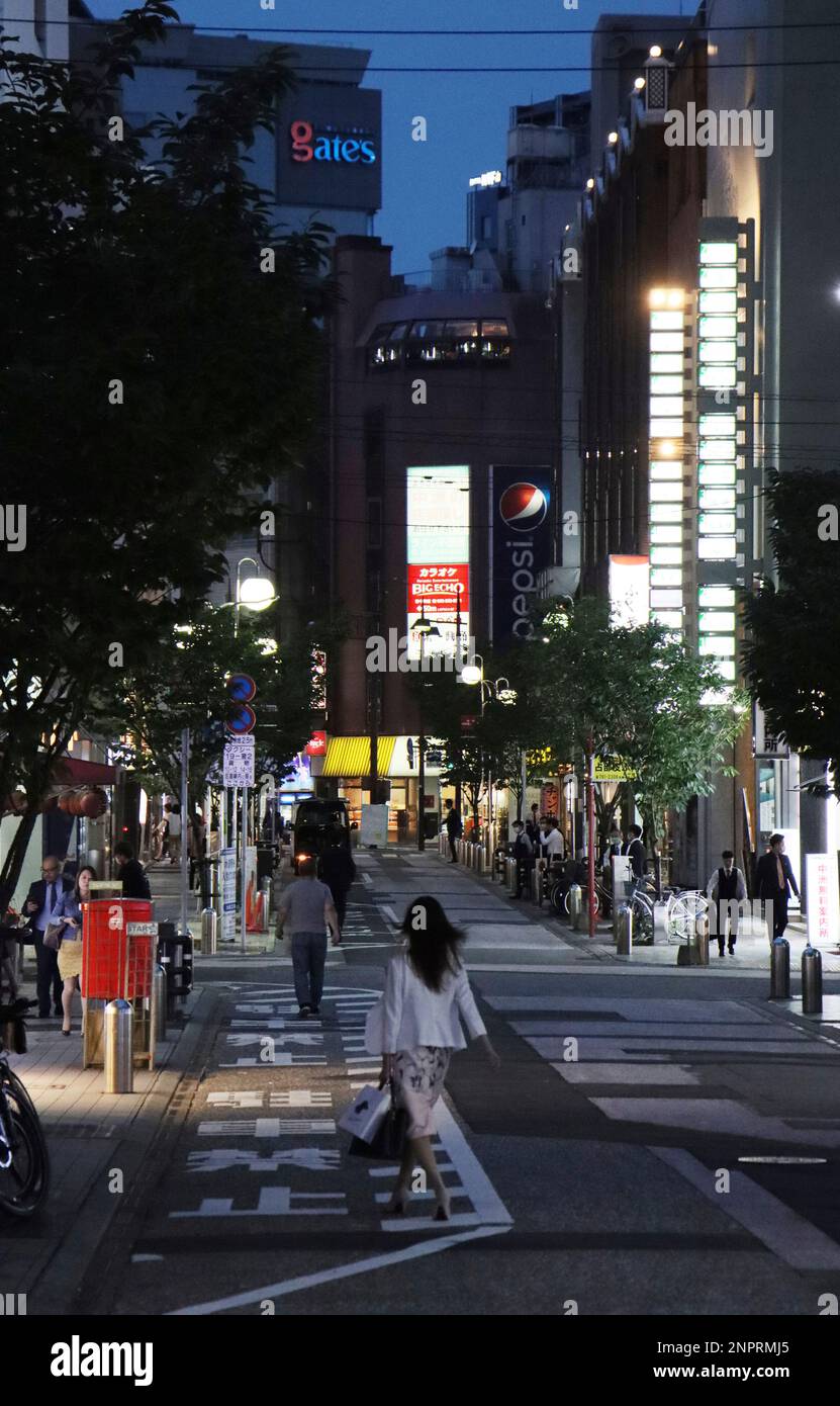 A photo shows Nakasu district in Fukuoka, Kyusyu region, western Japan, on July 2, 2020. Nakasu is the red-light district, is named after a popular, but very short-lived, entertainment quarter of Edo, which existed in the late 18th century. The name "Nakasu" can be translated as "the island in the middle" as Nakasu is an island between two rivers. ( The Yomiuri Shimbun via AP Images ) Stockfoto