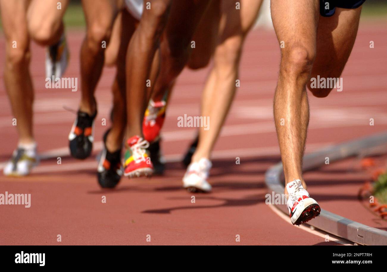 General view of runners' spikes in first round heat of 1,500-meters in the USA Track & Field Championships at IUPUI's Michael A. Carroll Stadium in Indianapolis, Indiana on Friday, June 23, 2006. (Kirby Lee via AP) Stockfoto