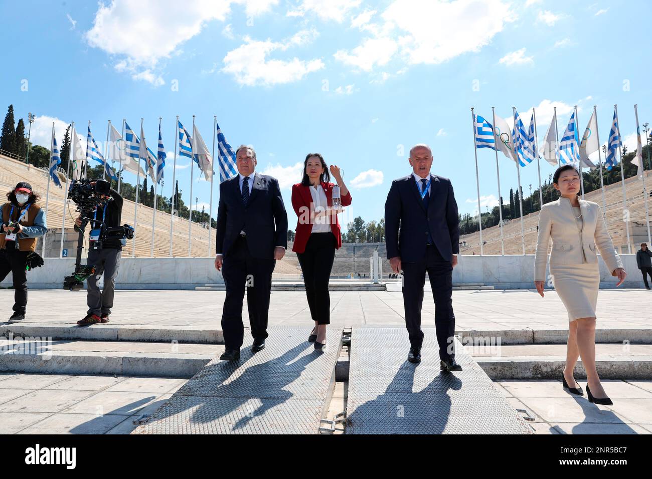 Naoko Imoto of Japan, former Olympic swimmer, holds the Olympic Flame
