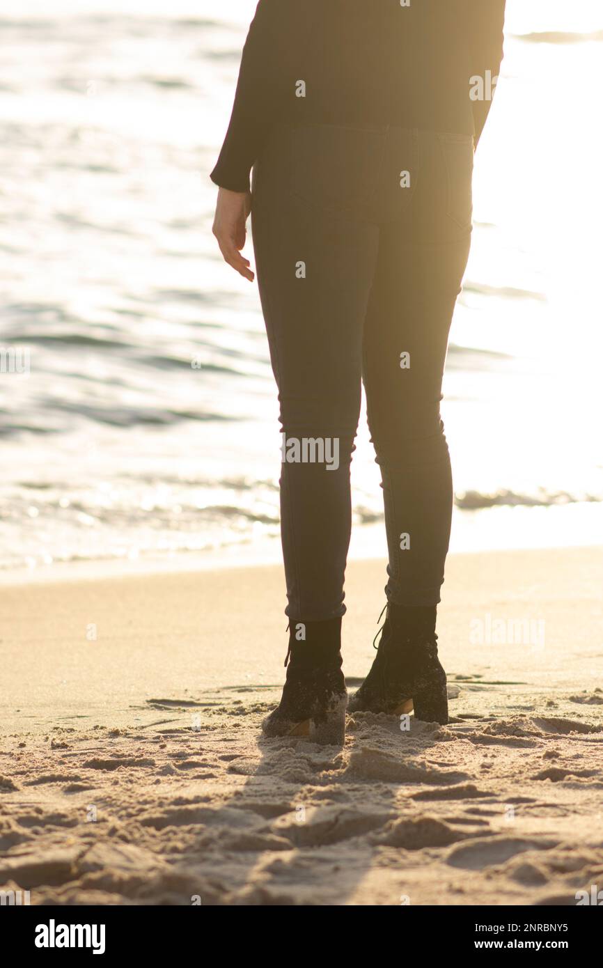 Frau am Strand Stockfoto