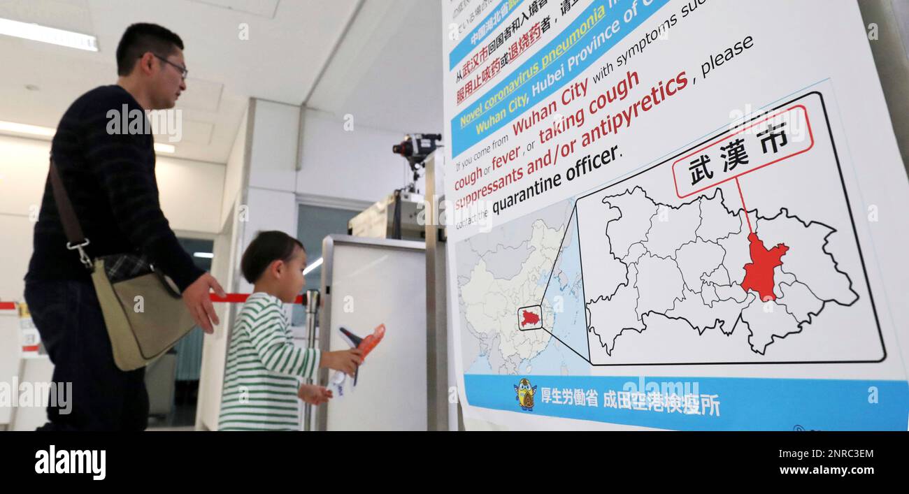 Passengers pass at quarantine inspection during the time when a flight