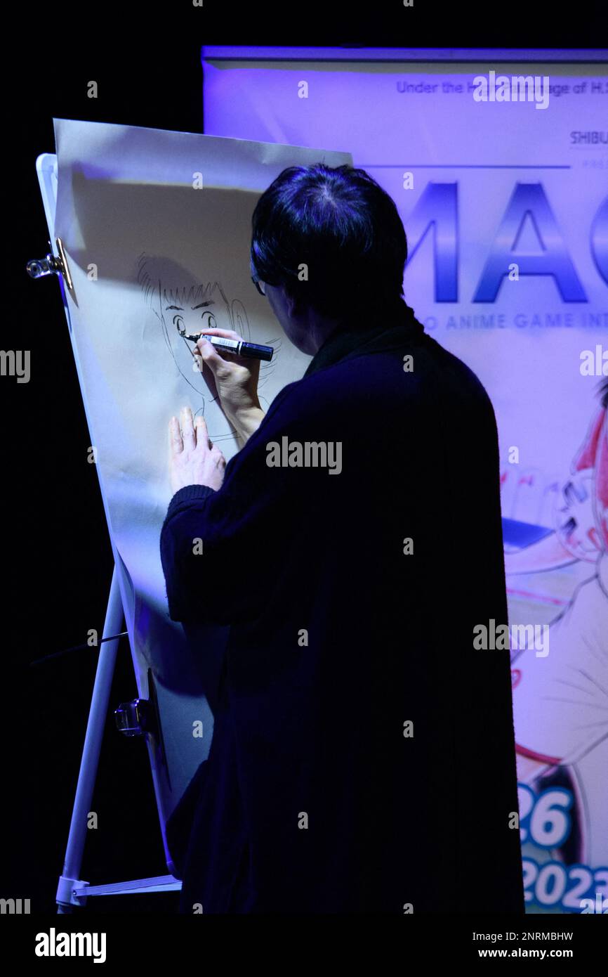 Yoichi Takahashi, großer japanischer Mangaka, zeichnet auf der Magic Monaco Konferenz. 1980 veröffentlichte er seine erste Serie in der Zeitschrift Shōnen Jump, Captain Tsubasa, bekannt als Olive und Tom in Frankreich. Diese Fußballserie ist ein großer Erfolg und wird sogar in eine animierte Fernsehserie umgewandelt. MAGIC ist eine Veranstaltung für alle Popkultur-Fans, die Kunst, Animation, Videospiele, Manga, Comics, Wissenschaft und Bildung, am 25. Und 26. Februar 2023 auf dem Grimaldi-Forum in Monaco. Foto von Jana Nennen Sie mich J/ABACAPRESS.COM Stockfoto