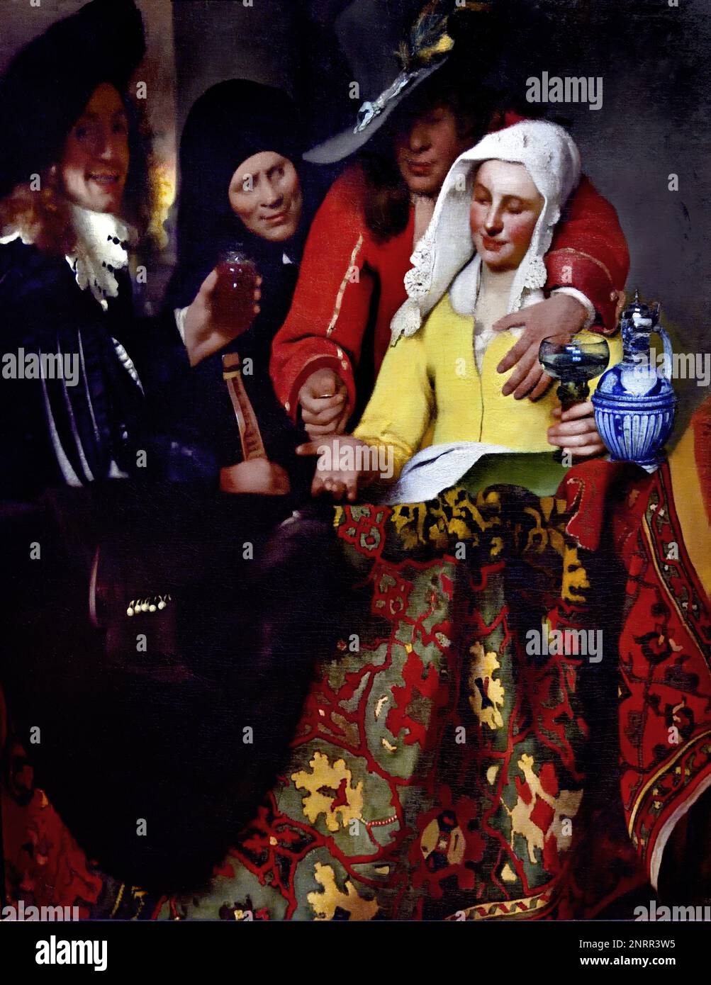 The Procuress 1656 von Johannes Vermeer oder Jan Vermeer 1632 - 1675, Delft, Niederlande, Niederländisch, Holland, (Holländischer Maler im Goldenen Zeitalter, einer der größten Maler des 17. Jahrhunderts. Bevorzugte zeitlose, gedämpfte Momente, bleibt rätselhaft, unnachahmliches Farbschema und verwirrender Lichtinhalt) Stockfoto