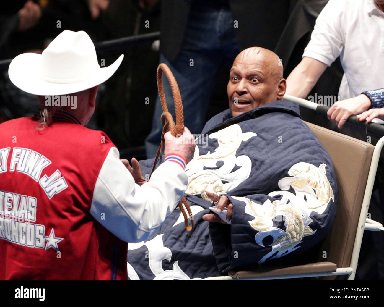 Abdullah the Butcher (R), a professinal wrestler, reacts against Doly