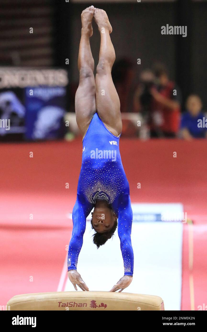 U.S. Simone Arianne Biles performs on uneven parallel bars during the women