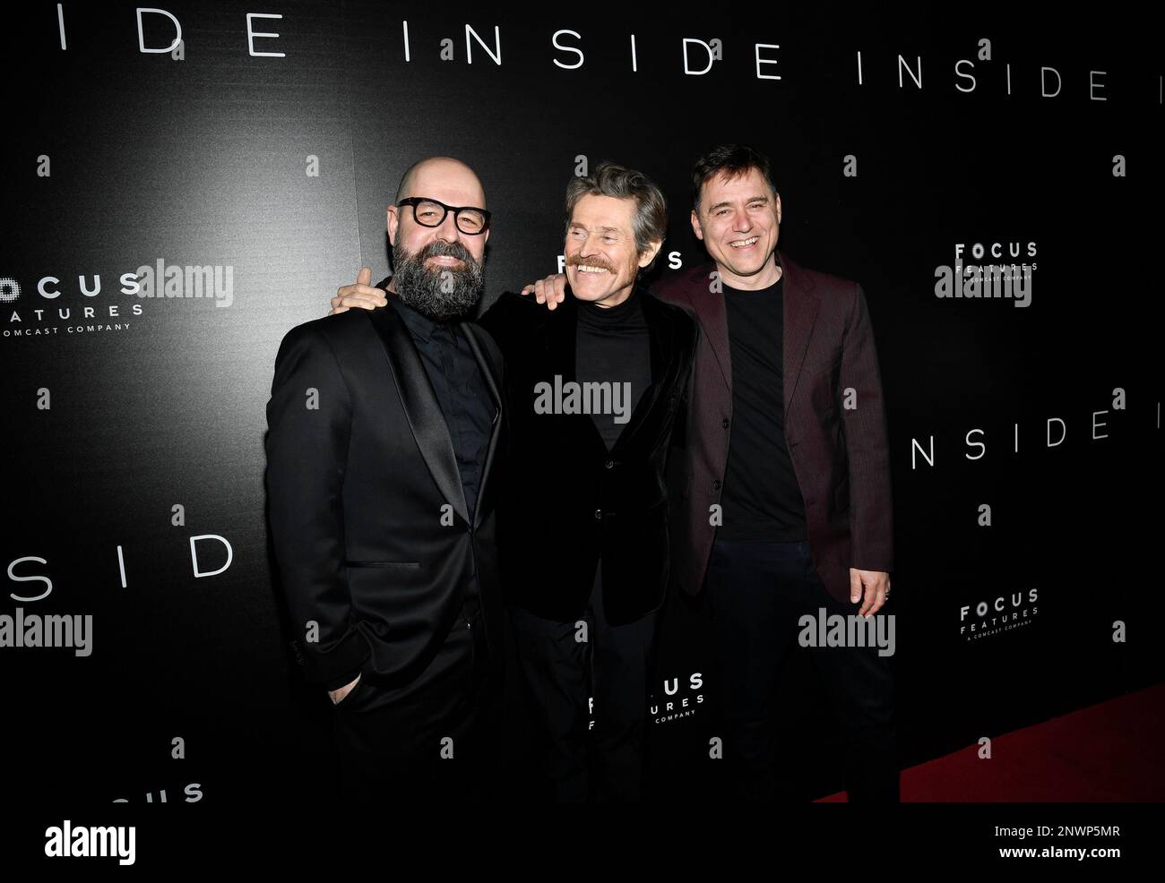 Director Vasilis Katsoupis, left, actor Willem Dafoe and producer Giorgos Karnavas attend a special screening of "Inside" at Metrograph on Tuesday, Feb. 28, 2023, in New York. (Photo by Evan Agostini/Invision/AP) Stockfoto