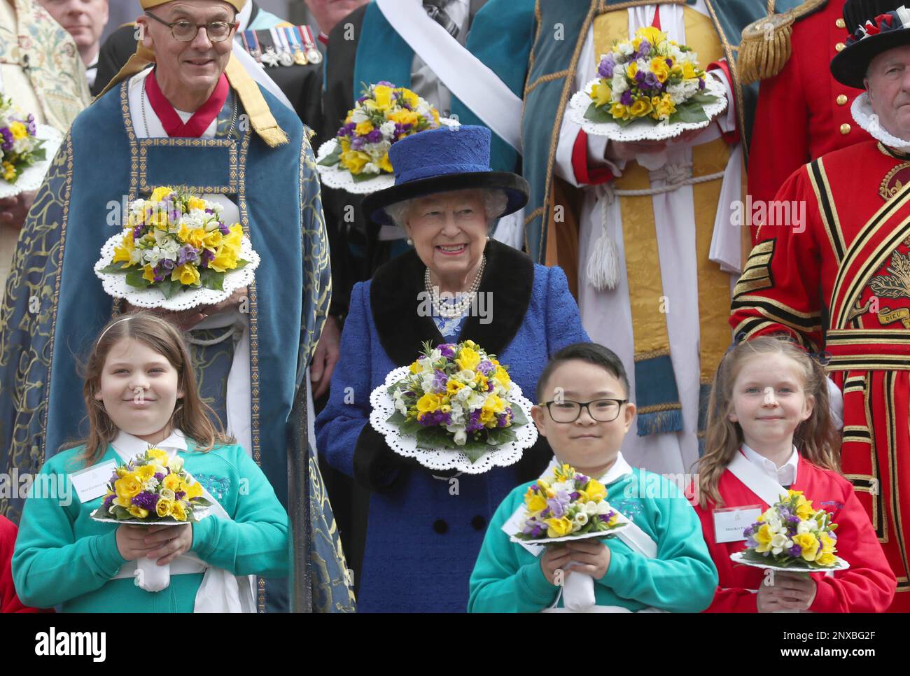 Britain's Queen Elizabeth II after attending the Royal Maundy service at St George's Chapel in Windsor, Thursday March 29, 2018. It has been the custom since the thirteenth century for British royalty to take part in the distribution of gifts or money on Maundy Thursday. Recipients, as many elderly men and women as there are years in the sovereign's age are chosen because of their Christian service to the Church and community. (Steve Parsons/Pool Photo via AP) Stockfoto