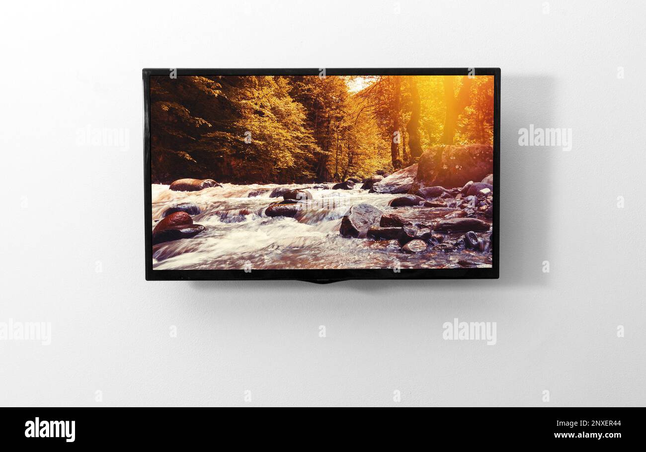 TV-Monitor an der Wand Stockfoto