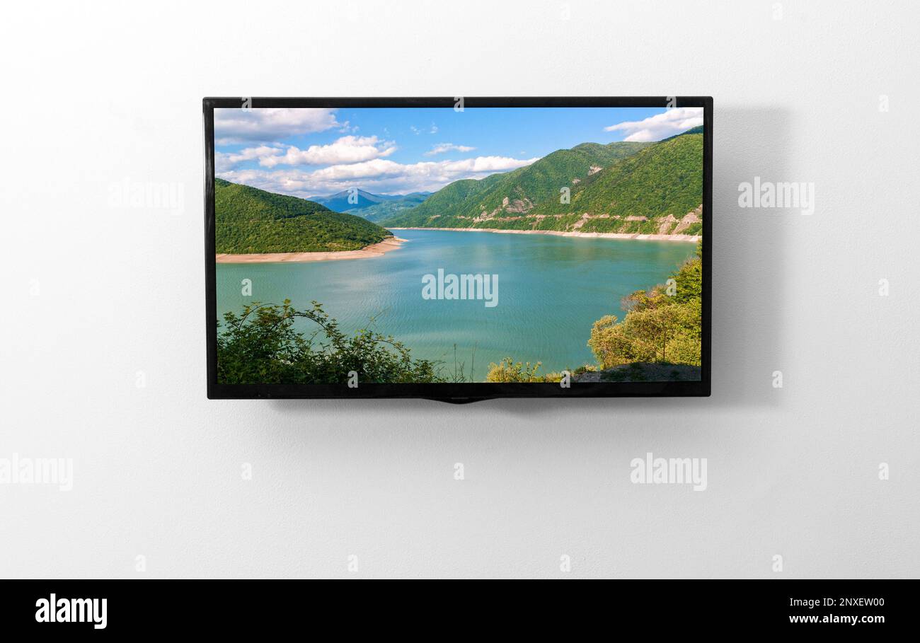 TV-Monitor an der Wand Stockfoto