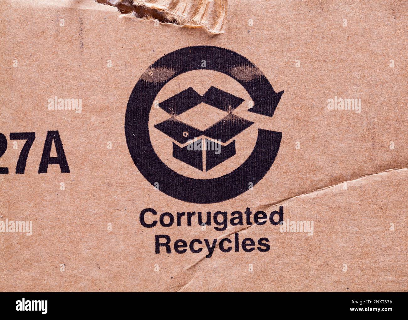 Braune Wellpappe Recycelt Symbol Backgound. Stockfoto