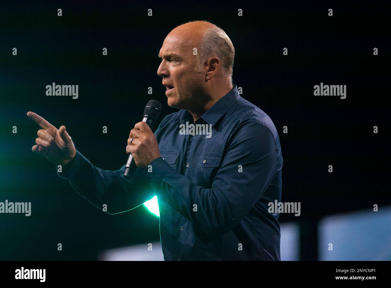 Greg Laurie delivers his sermon during the opening night of Harvest ...