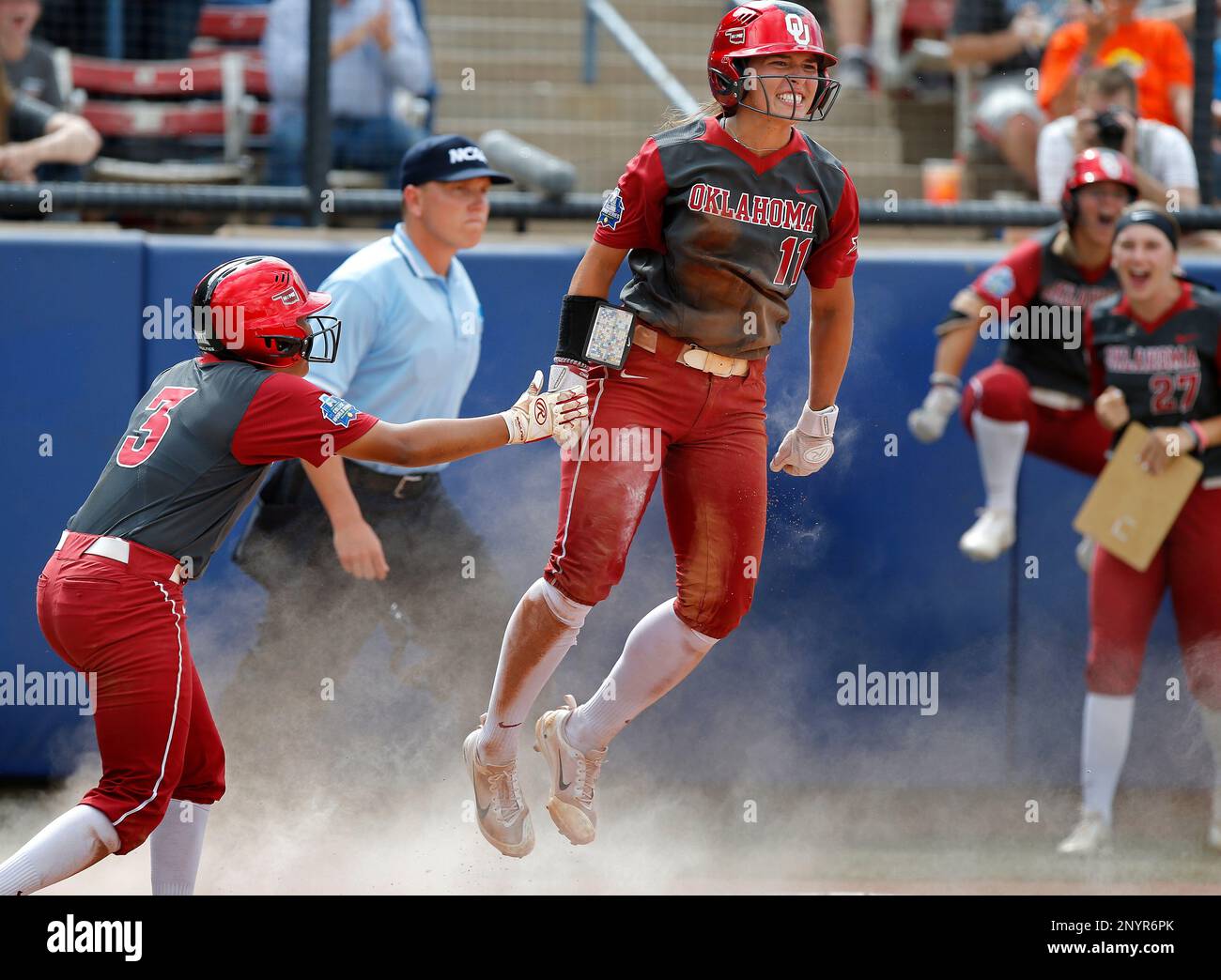 Oklahoma's Nicole Mendes (11) and Kelsey Arnold (3) celebrates a score