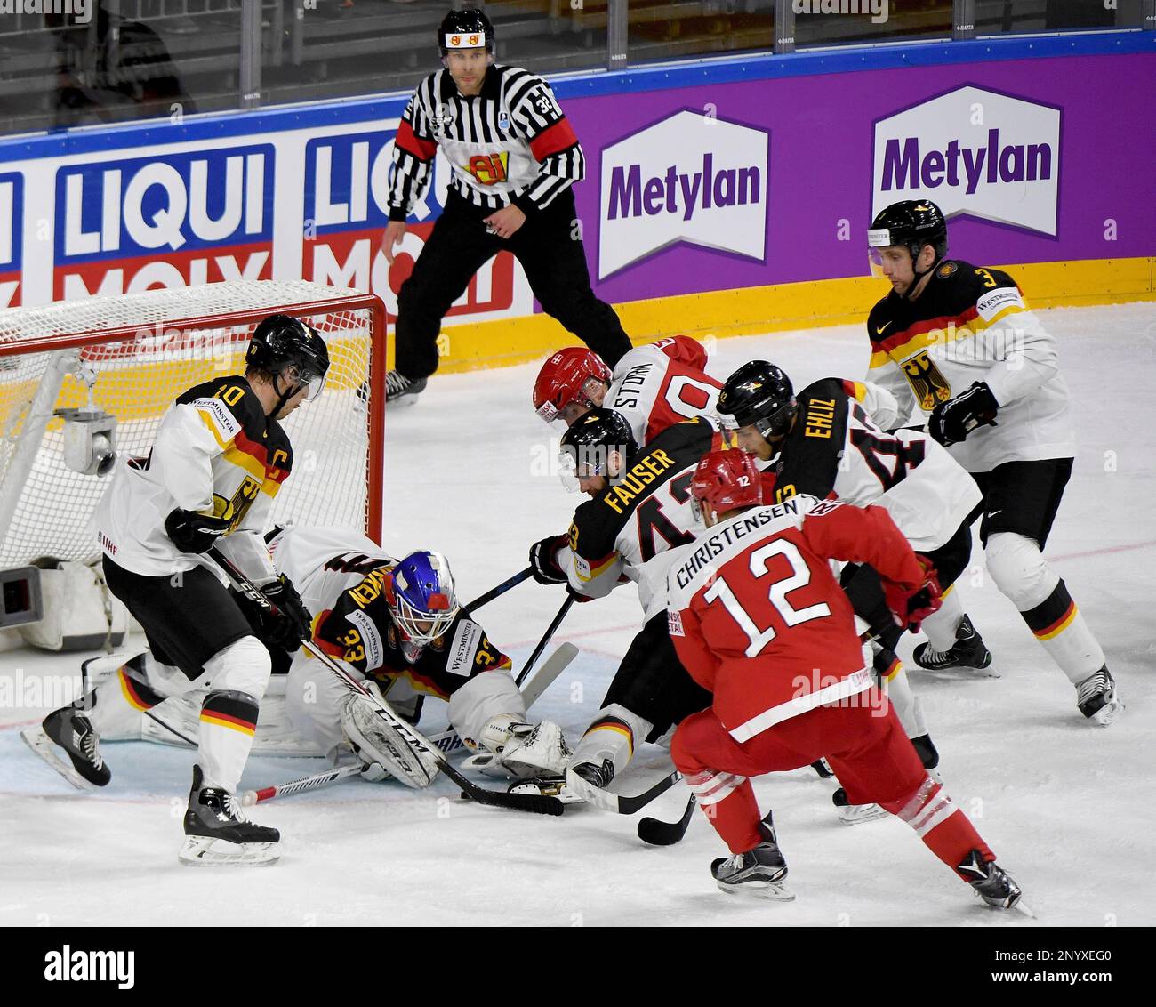 Germany goalkeeper Danny aus den Birken catches the puck during the Ice