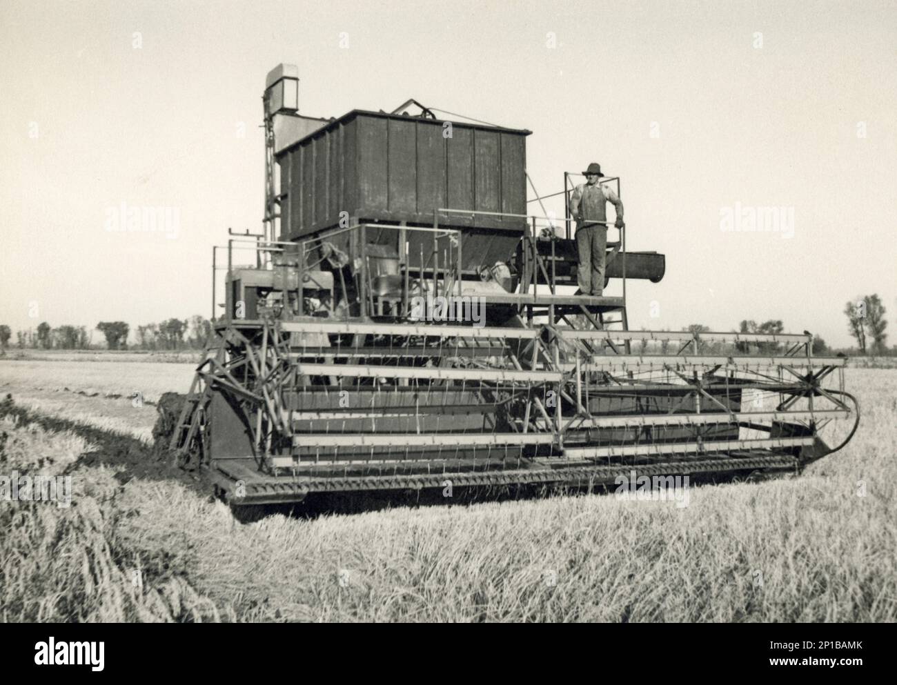 Mähdrescher ca. 1900er, Front, Vintage American Farm Equipment, Farmer Stockfoto