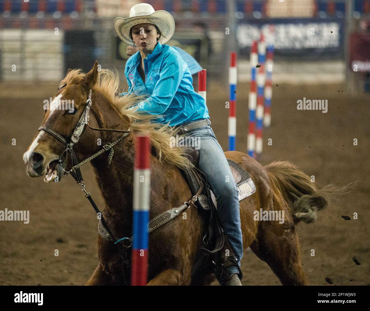 Madison Valencia, of Windfield, Pa., competes in Pole Bending during