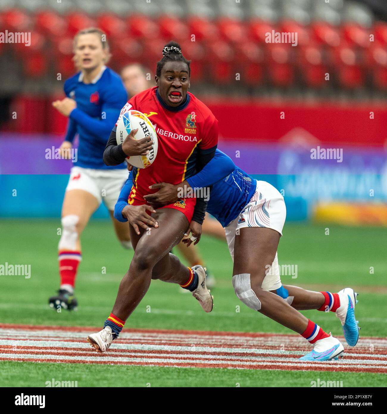 Vancouver, Kanada. 3. März 2023. Tecla Masoko Bueriberi #23 aus Spanien wehrt sich am 1. Tag ab – HSBC Canada Sevens 2023 gegen Frankreich auf dem BC Place in Vancouver, Kanada. Kredit: Joe Ng/Alamy Live News. Stockfoto