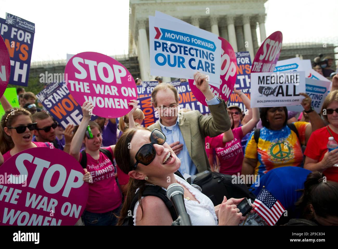 UNITED STATES - JUNE 28: Angela Botticella (C) of "Know Your Care, Support Your Care," celebrates with supporters of the Affordable Care Act as the Supreme Court announced it decision about the constitutionality of the law. The court upheld the law, voting 5-4. (Photo by Chris Maddaloni/CQ Roll Call) (CQ Roll Call via AP Images) Stockfoto