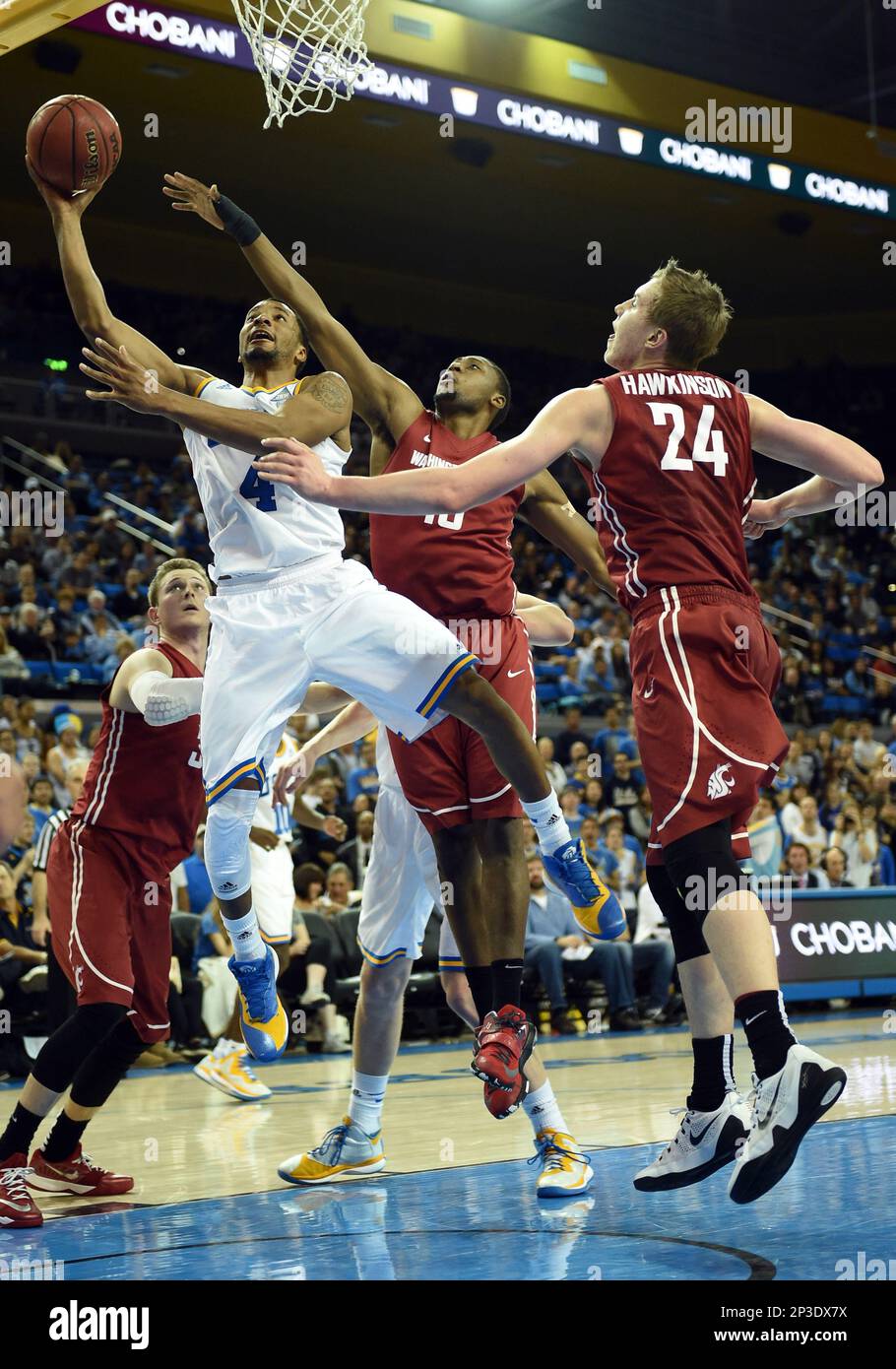 01 March 2015: UCLA (4) Norman Powell shoots around Washington State (24) Josh Hawkinson during an NCAA basketball game between the Washington State Cougars and the UCLA Bruins at Pauley Pavilion in Los Angeles, CA. (Icon Sportswire via AP Images) Stockfoto