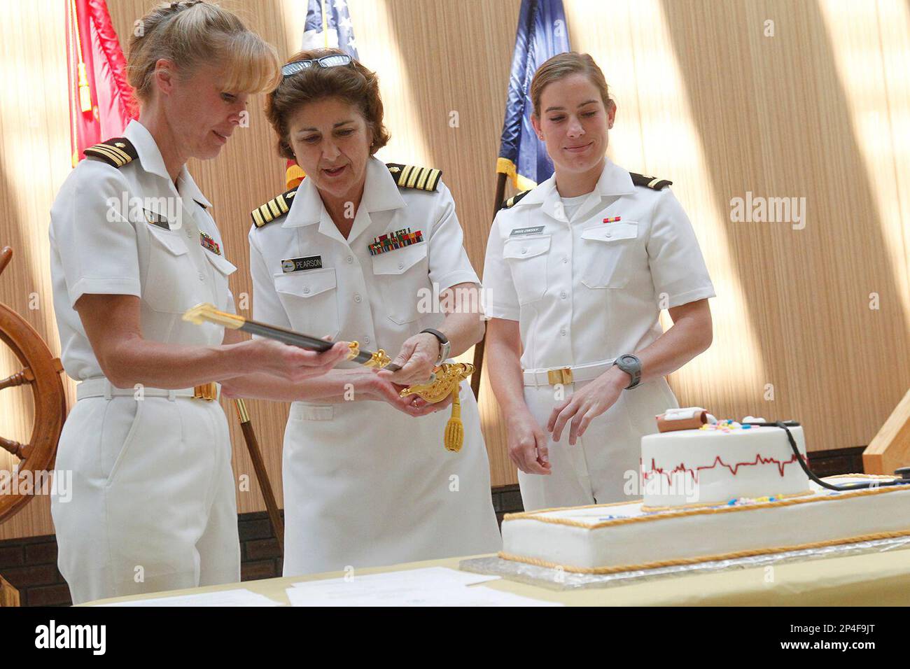 Lt. Cmdr. Lorrie Meyer, Capt. Nancy Pearson, and ENS Elizabeth