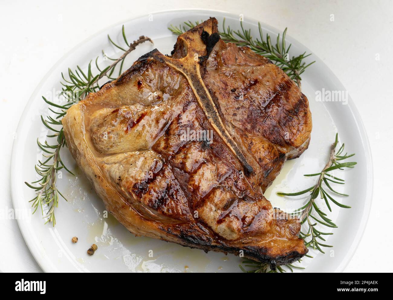 Florentiner Steak auf dem weißen Gericht Stockfoto
