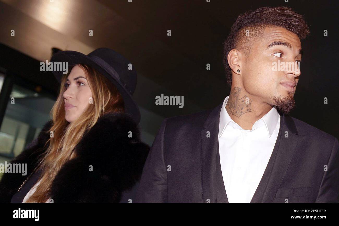 AC Milan’s midfielder and Ghana international soccer player Kevin-Prince Boateng, right, and his girlfriend Melissa Satta arrive at the FIFA headquarters in Zurich, Switzerland, Zurich, Friday, March 22, 2013. Boateng, who led teammates off the field in protest over racist chants from fans during a friendly match in January, was invited by FIFA President Joseph Blatter to exchange views on the best way to fight against racism in football. (AP Photo/Keystone, Walter Bieri) Stockfoto
